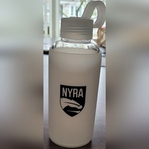 NYRA beverage container and 2 Wood Memorial coasters